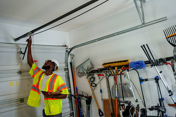 Professional Garage Door technician working in Maplewood, MN